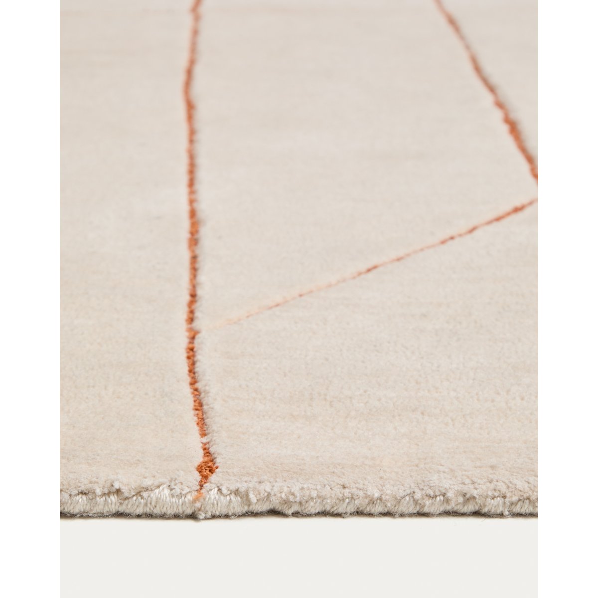 Delide ecru synthetic fibre rug with orange graphic detail 160 x 230cm