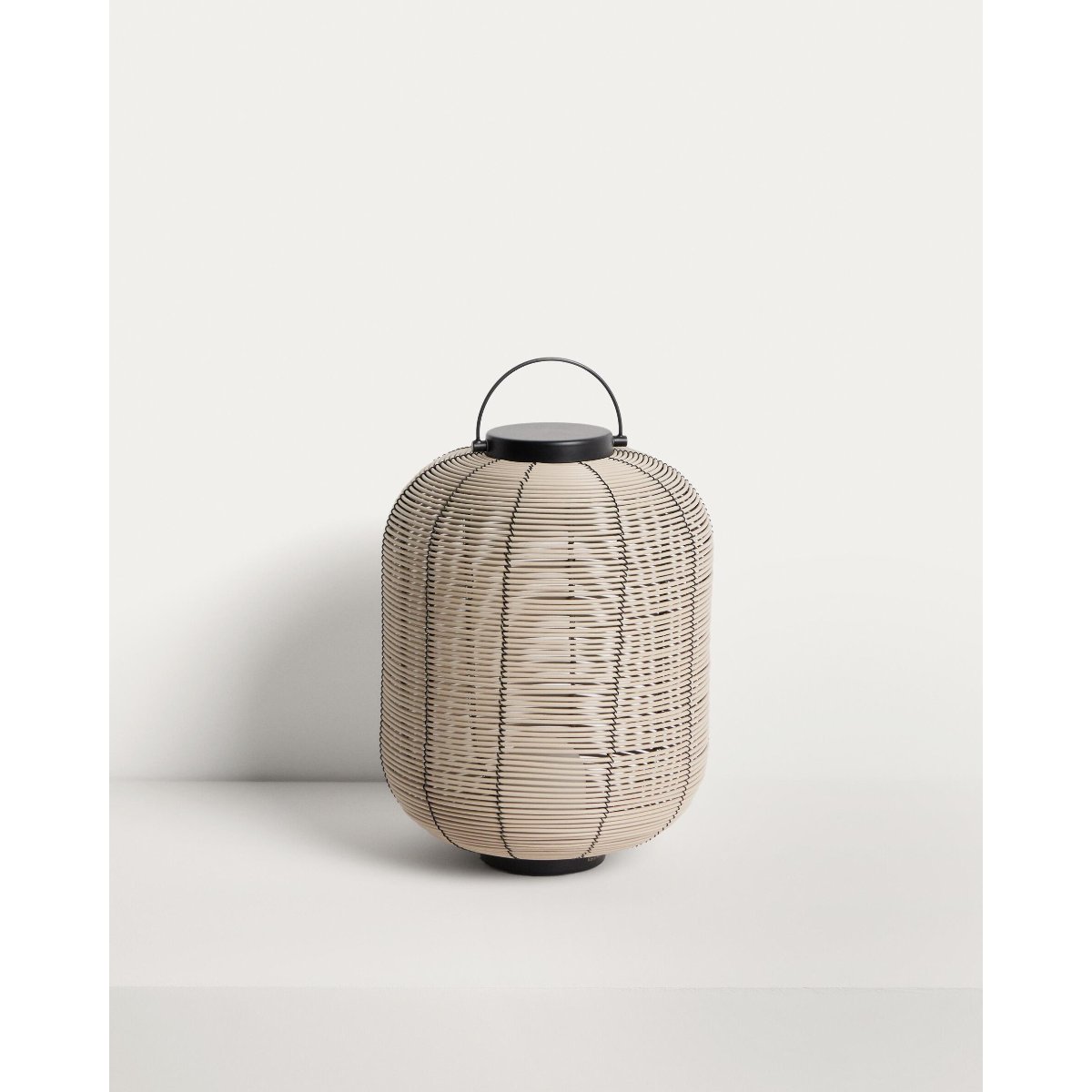 Saranella small portable LED table lamp in light grey synthetic rattan